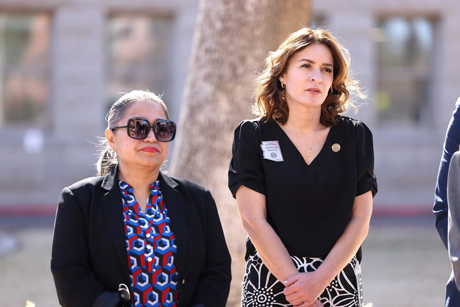 State Representatives Mariana Sandoval and Stephanie Simacek speaking with the media at a press conference concerning housing and homelessness at the Arizona State Capitol in Phoenix, Arizona.