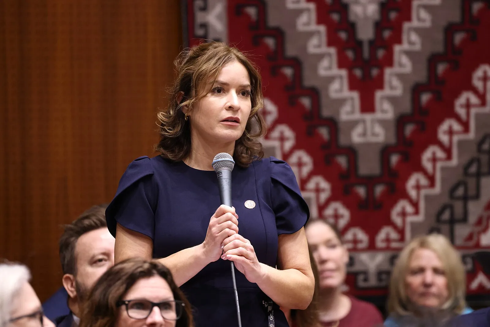 State Representative Stephanie Simacek speaking with attendees on the floor of the Arizona House of Representatives on opening day of the 57th legislature in Phoenix, Arizona.